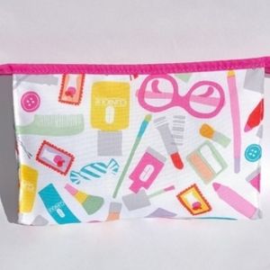 Clinique Cosmetic Makeup Bag glam print featuring lipgloss, lipstick, skin care